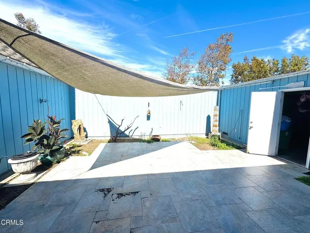 a view of a backyard of a house