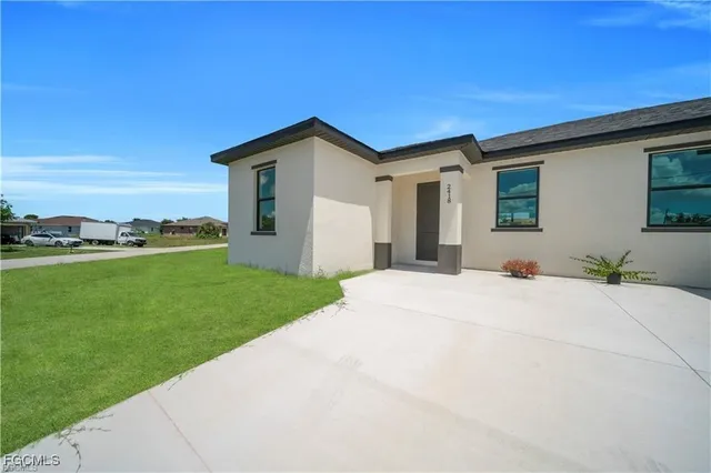 a house view with a garden space