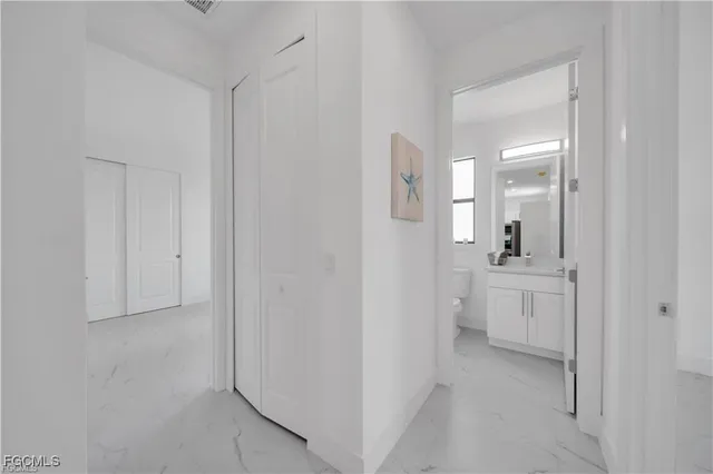 a bathroom with a shower and toilet