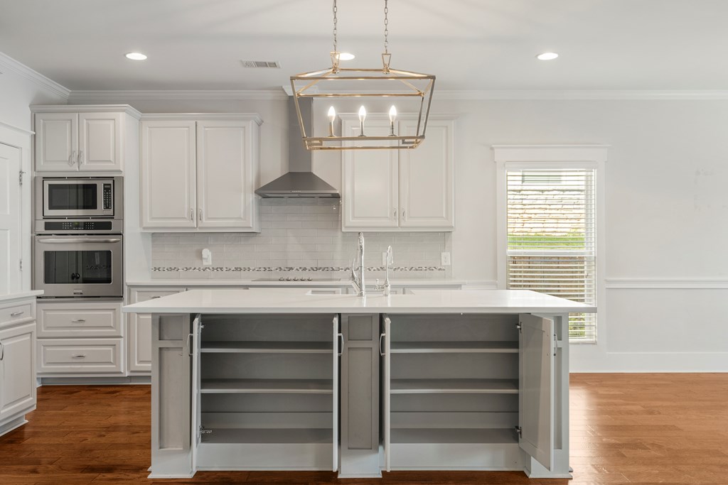 7044 Spring Walk Drive Columbus, GA 31904 - Photo 11 of 41 a kitchen with a sink and cabinets