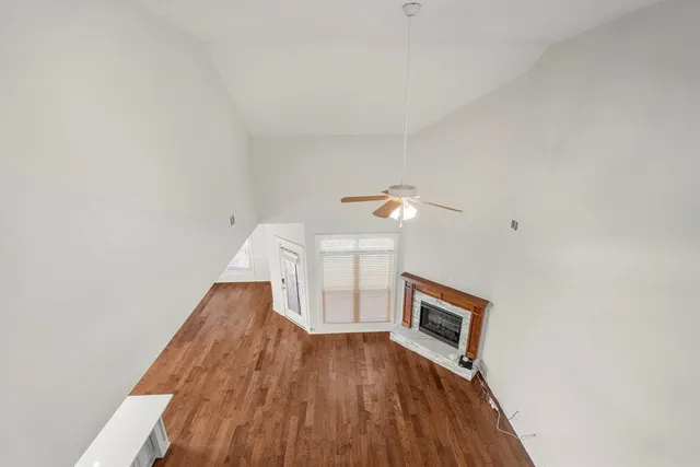 a view of a livingroom with wooden floor