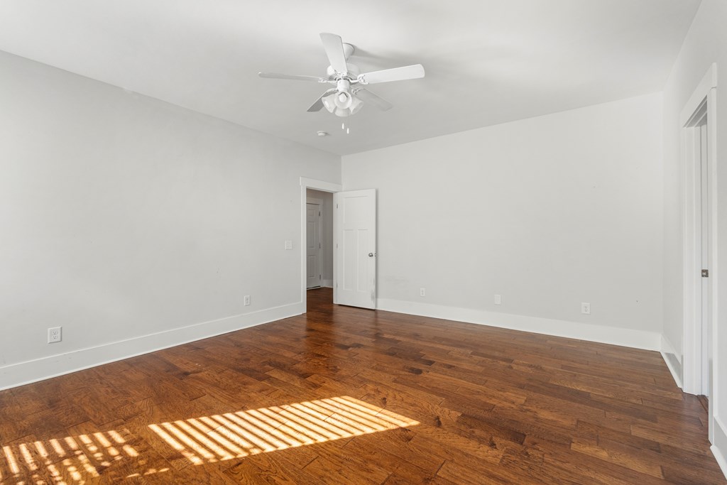 7044 Spring Walk Drive Columbus, GA 31904 - Photo 29 of 41 a view of an empty room with wooden floor