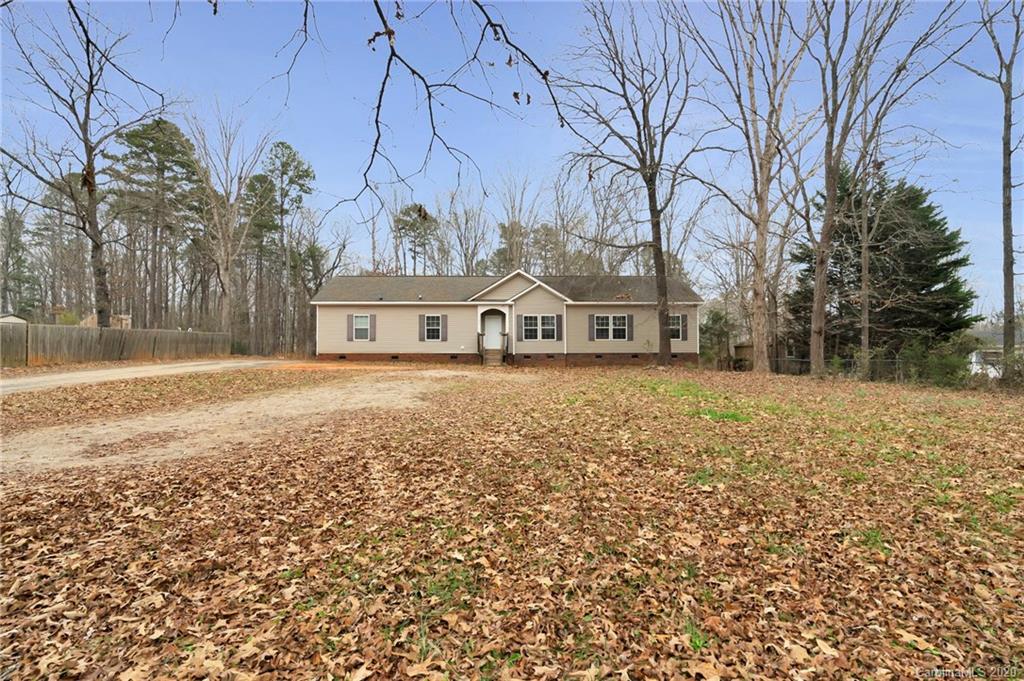 1790 Reservation Road, Unit 1 Rock Hill, SC 29730 - Photo 3 of 26 a view of a house with a yard and trees