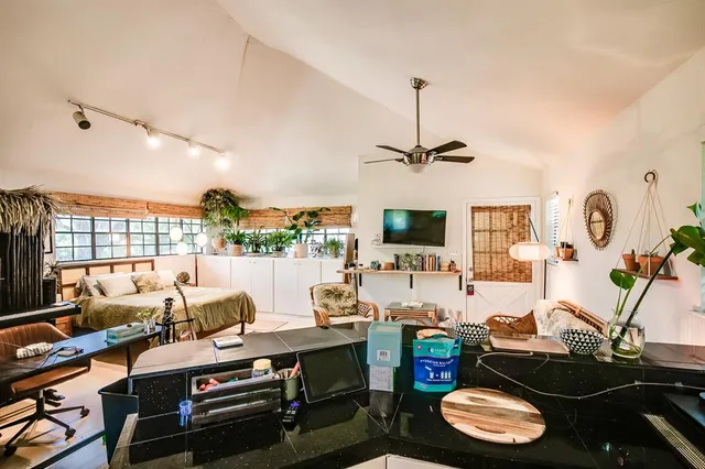 a room with furniture and a window