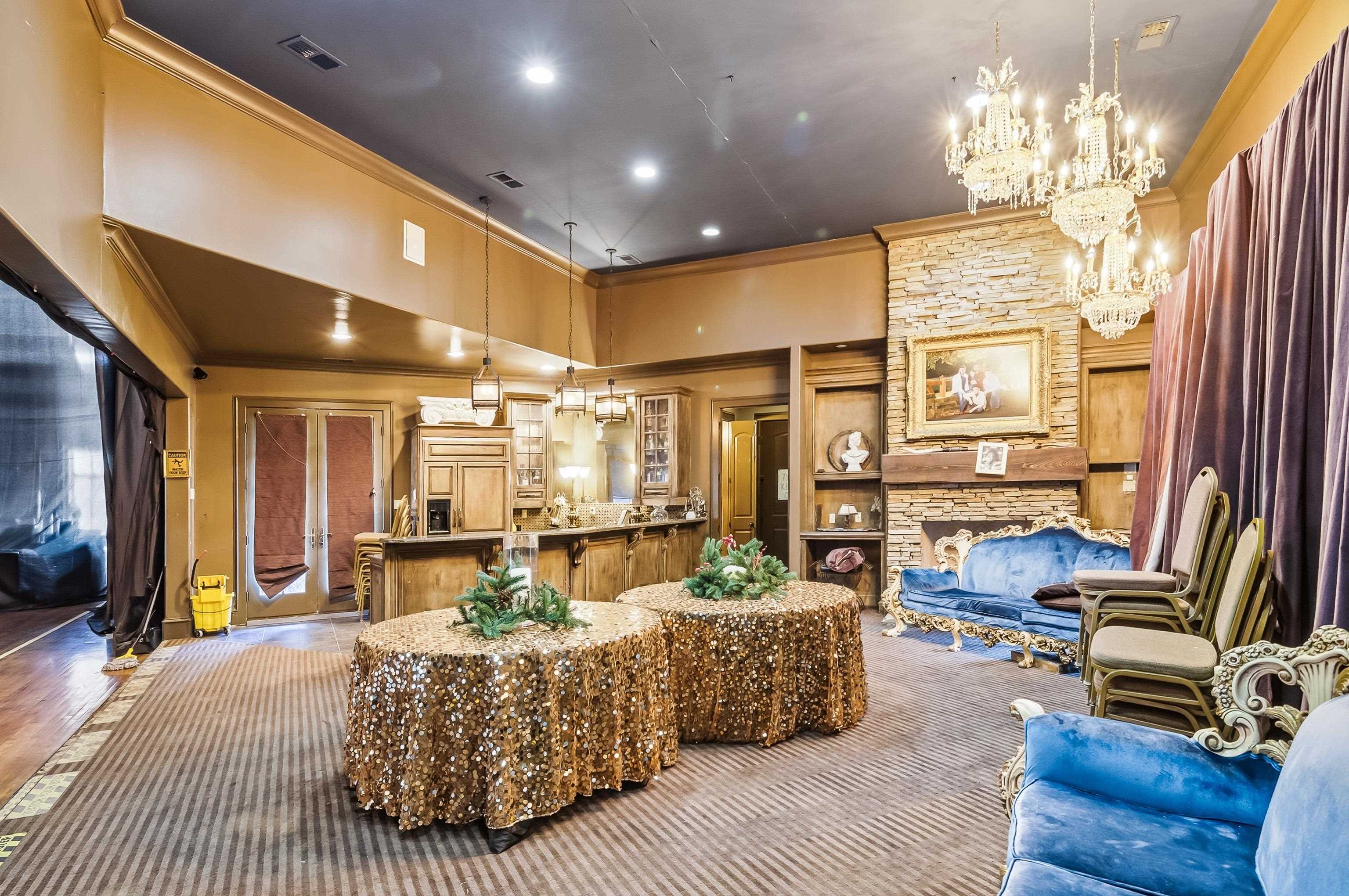 5110 Reynolds Road Collierville, TN 38017 - Photo 22 of 40 Living area featuring ornamental molding, a chandelier, a fireplace, carpet, and recessed lighting