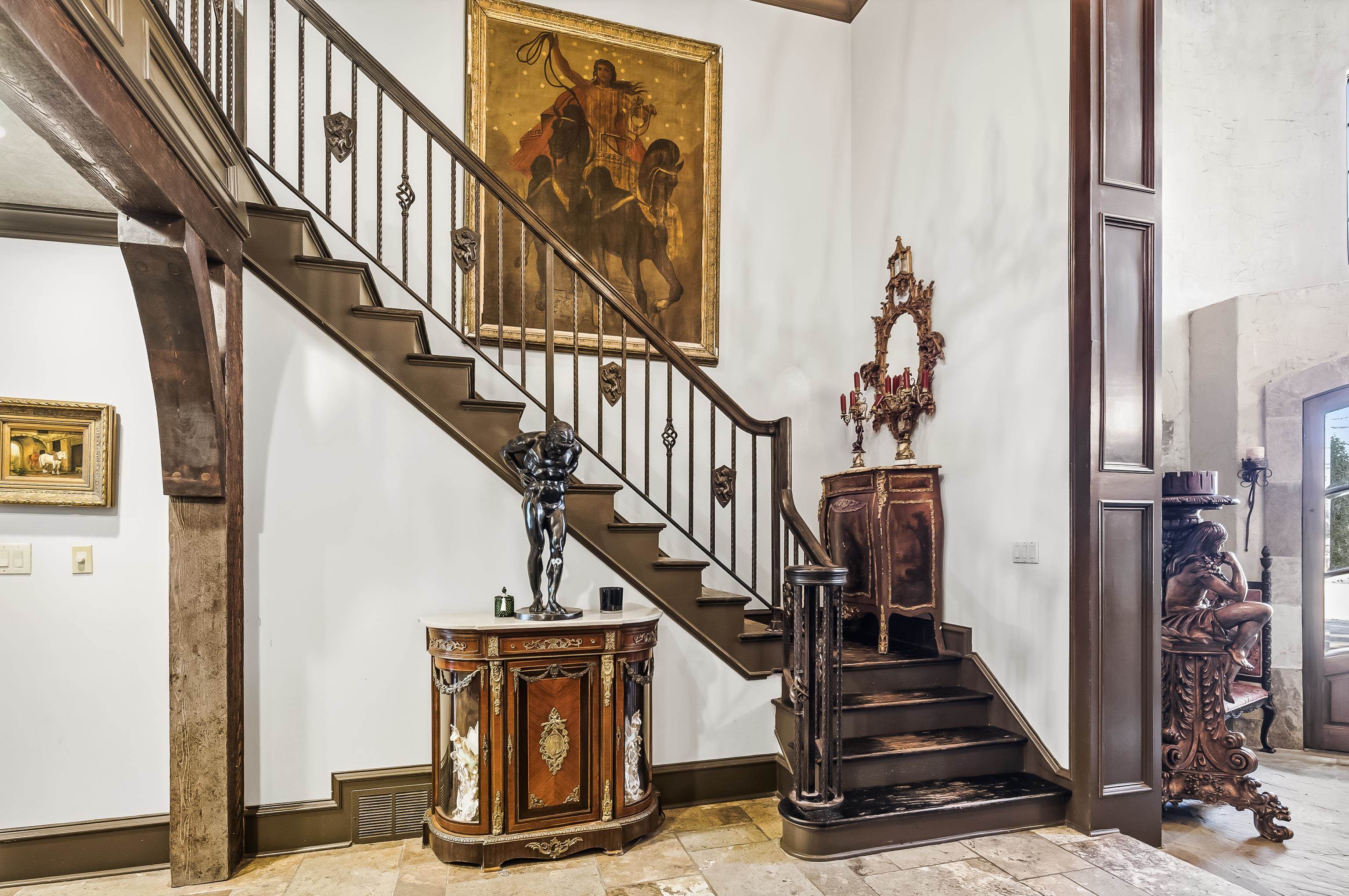 5110 Reynolds Road Collierville, TN 38017 - Photo 25 of 40 Staircase featuring stone tile floors and a towering ceiling