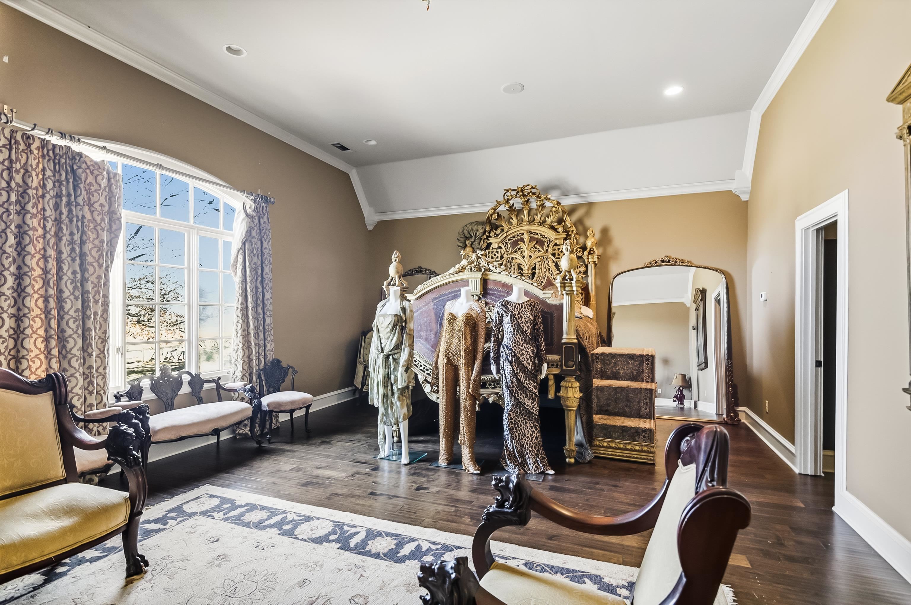 5110 Reynolds Road Collierville, TN 38017 - Photo 27 of 40 Bedroom featuring crown molding, arched walkways, wood finished floors, and recessed lighting