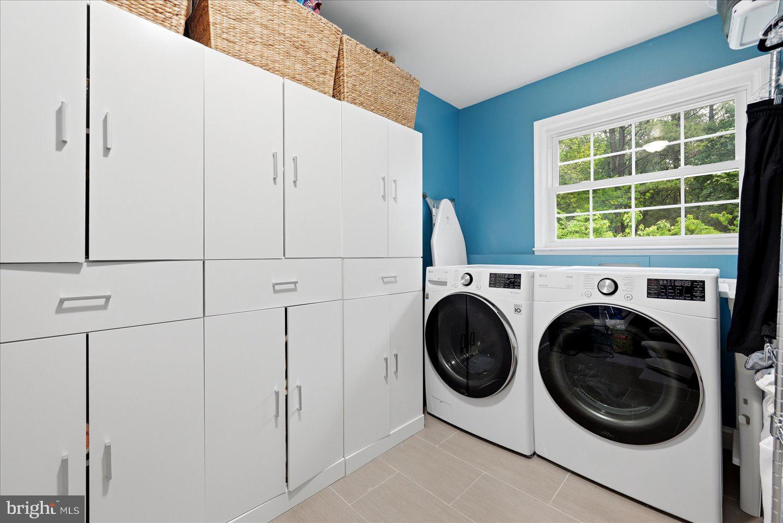 911 Riva Ridge Drive Great Falls, VA 22066 - Photo 24 of 55 Bright and functional laundry space.
