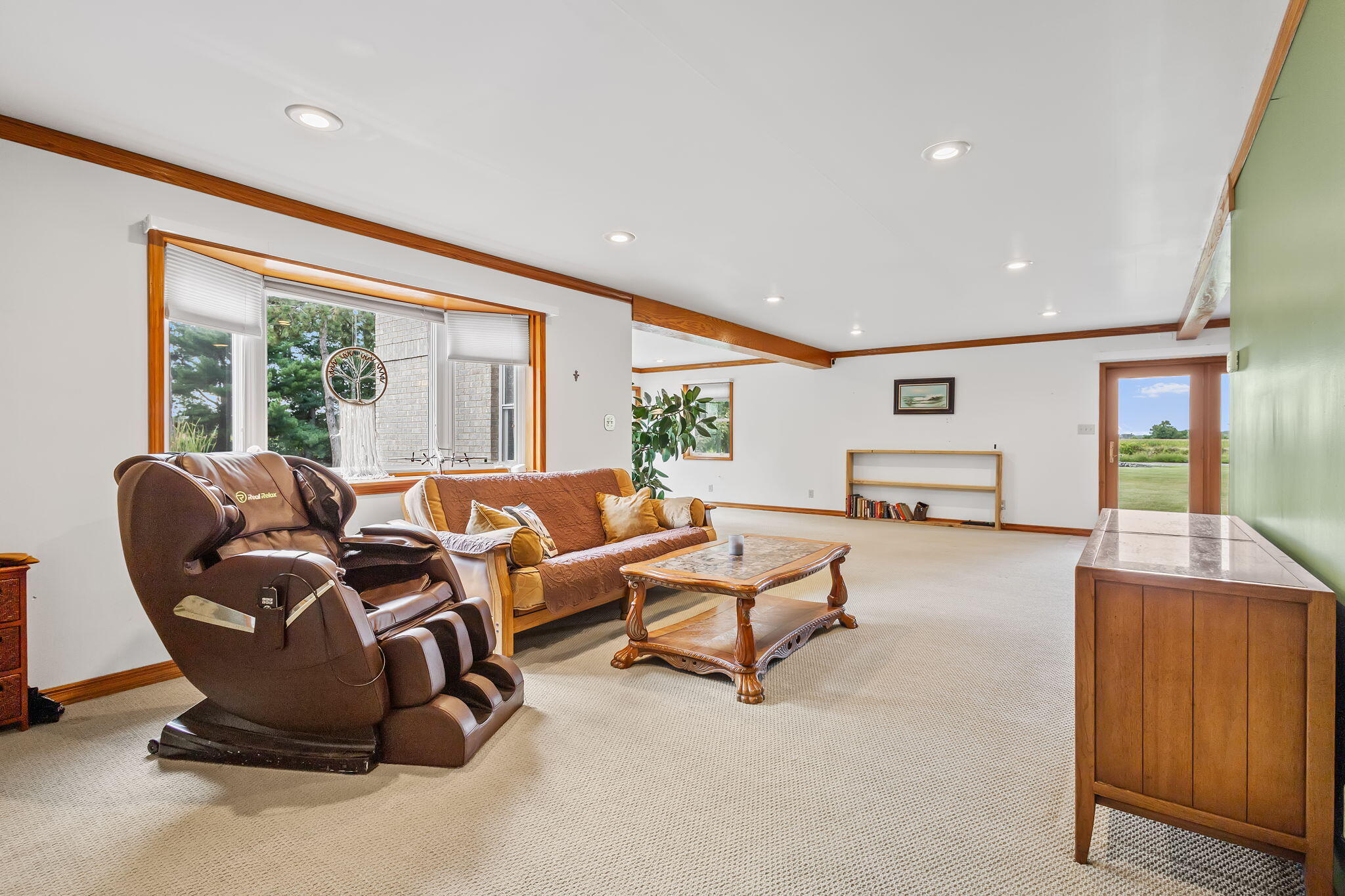 2549 East 1100 North Demotte, IN 46310 - Photo 11 of 74 a living room with furniture and a large window
