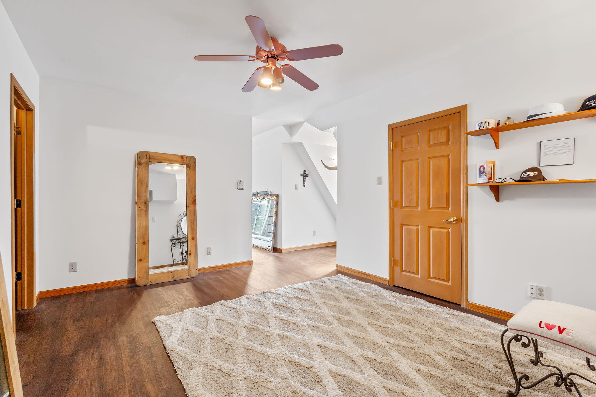 2549 East 1100 North Demotte, IN 46310 - Photo 21 of 74 a bedroom with a bed and a chandelier