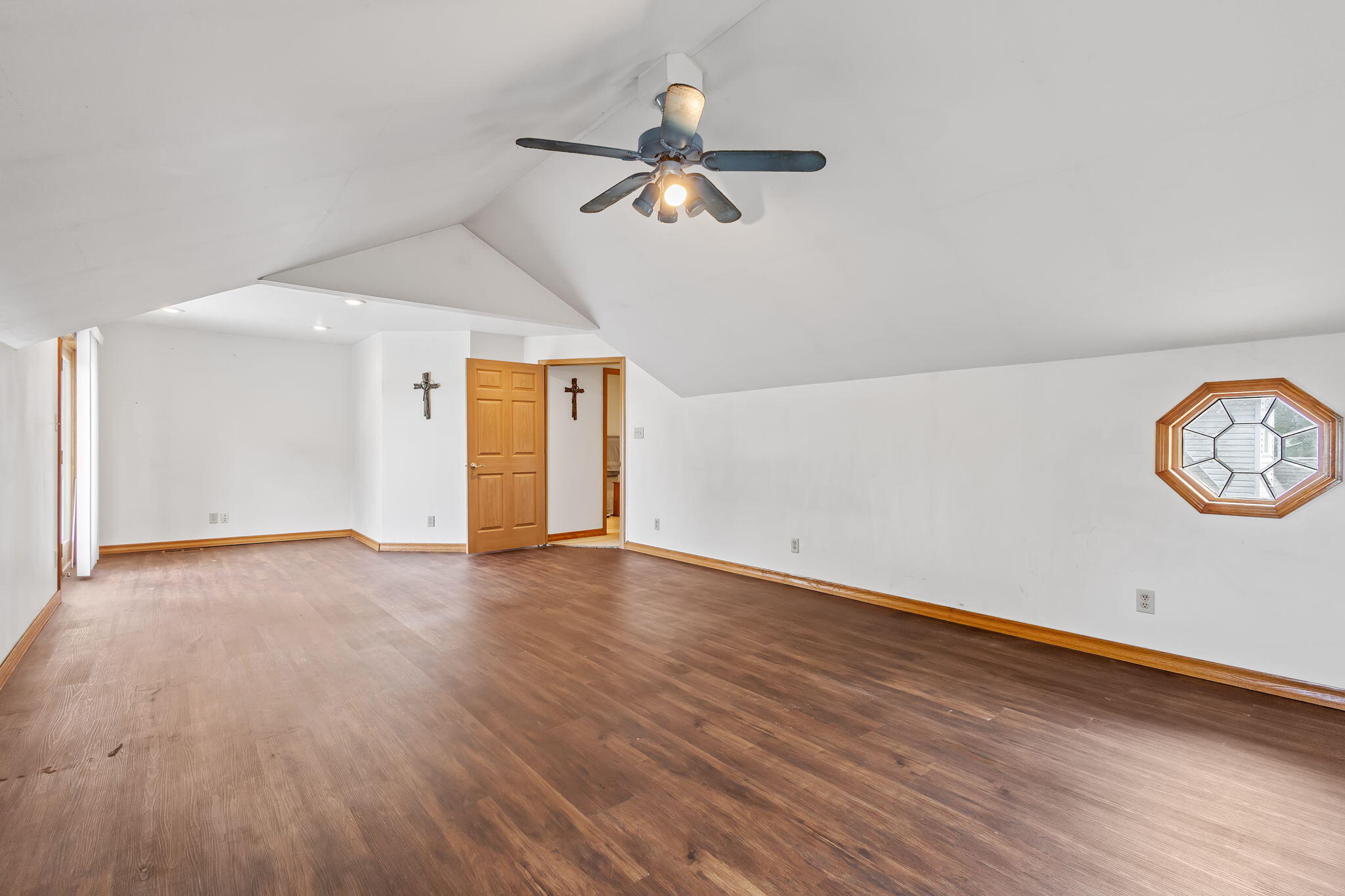 2549 East 1100 North Demotte, IN 46310 - Photo 25 of 74 an empty room with wooden floor and windows