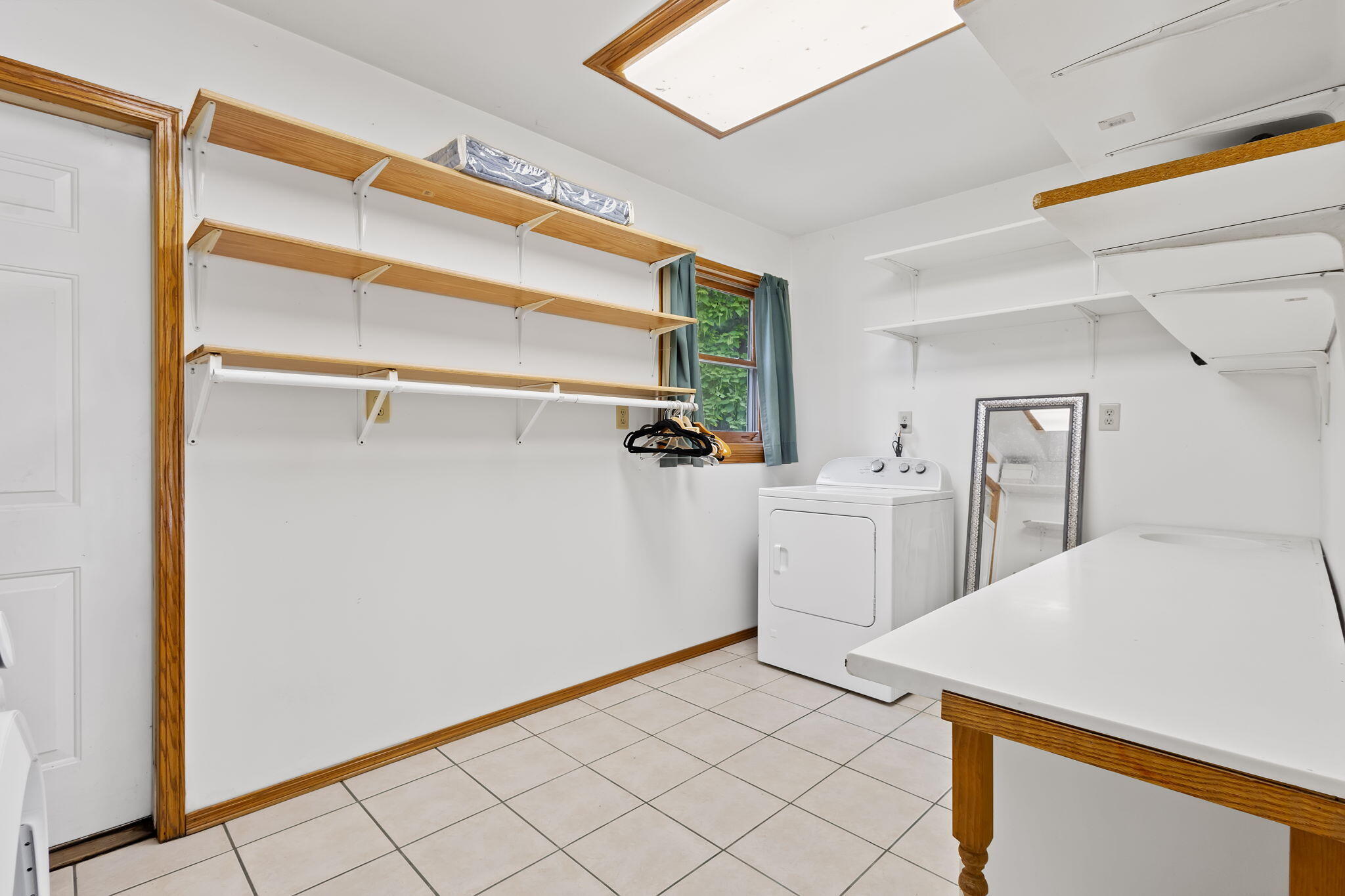 2549 East 1100 North Demotte, IN 46310 - Photo 36 of 74 a utility room with cabinets washer and dryer