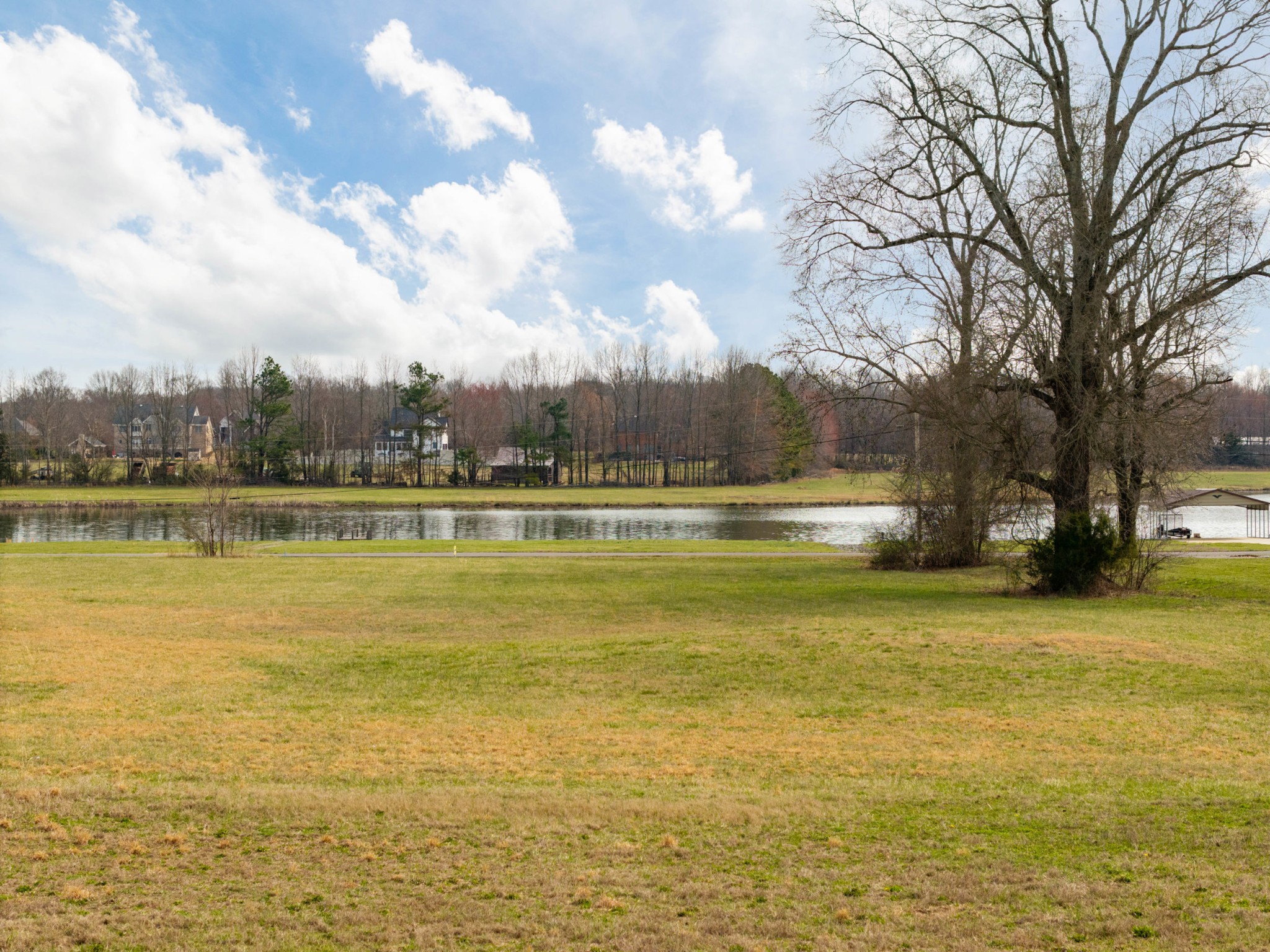 0 Rebecca West Road Fayetteville, TN 37334 - Photo 4 of 9 a view of a lake with a big yard