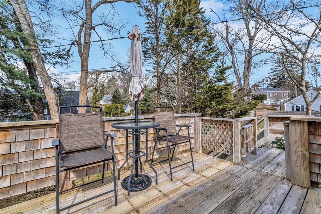 344 Main Street, Unit 5 Barnstable, MA 02632 - Photo 26 of 28 a view of balcony with wooden floor and outdoor seating