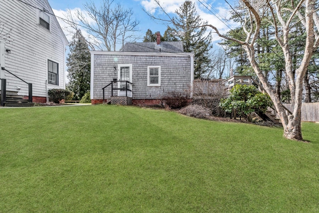 344 Main Street, Unit 5 Barnstable, MA 02632 - Photo 3 of 28 a view of a house with a yard