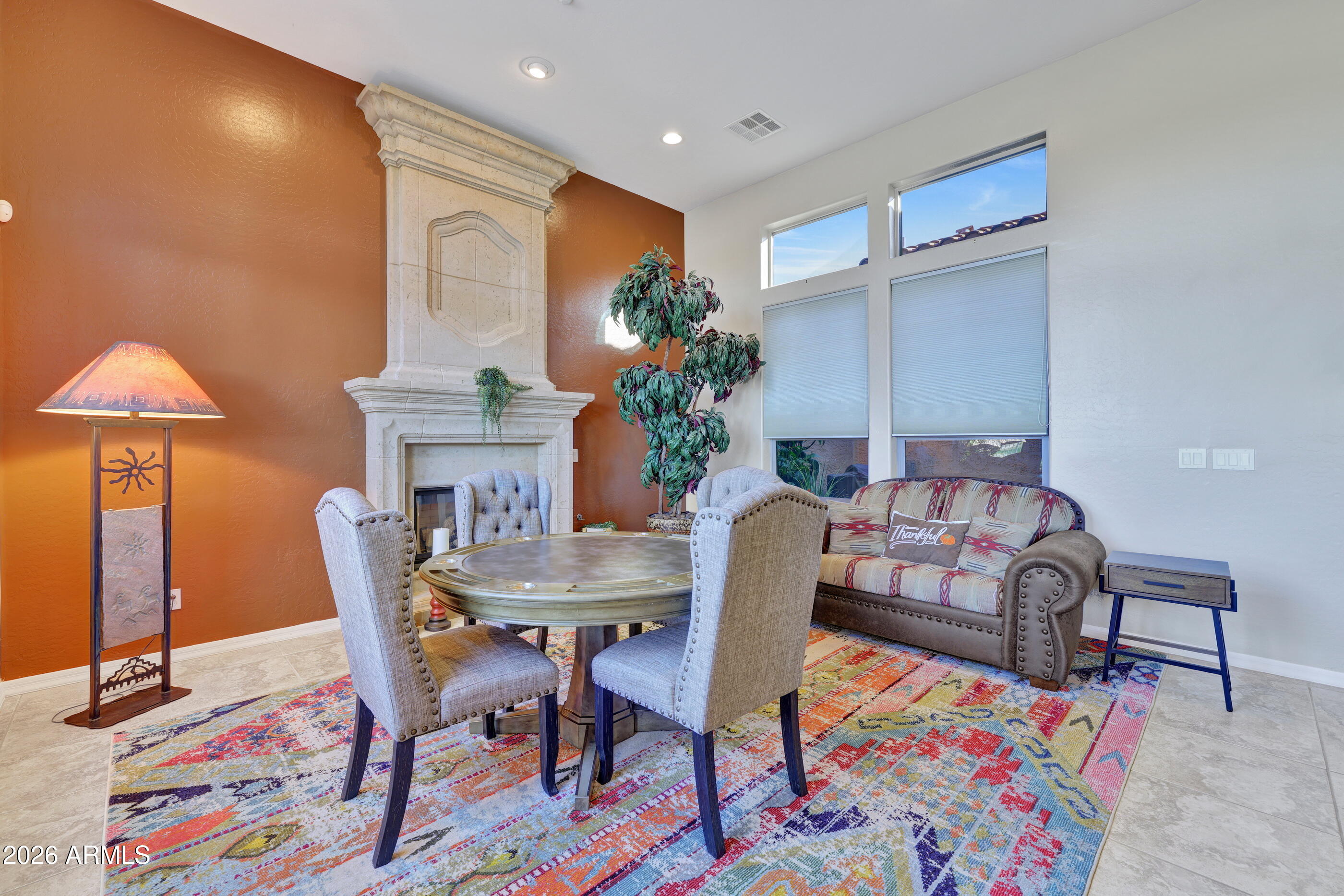 12510 West Bajada Road Peoria, AZ 85383 - Photo 28 of 84 a dining room with furniture and a rug