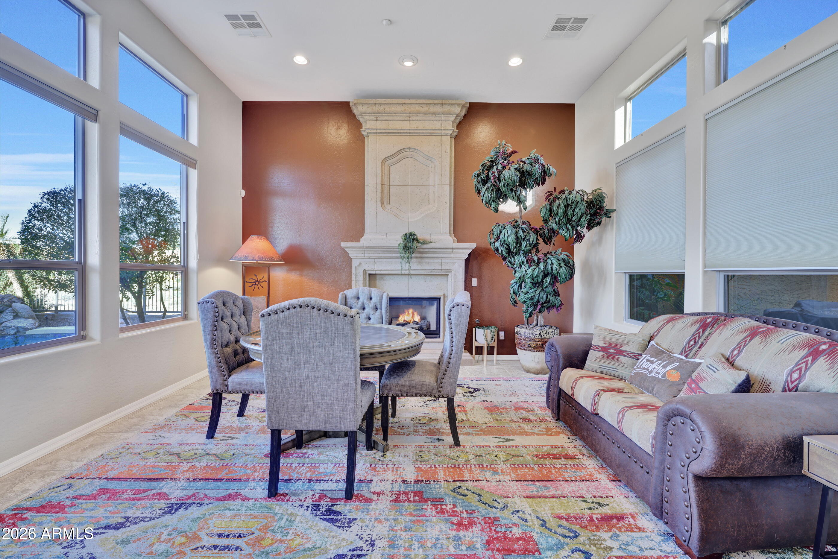 12510 West Bajada Road Peoria, AZ 85383 - Photo 29 of 84 a living room with furniture fireplace and window