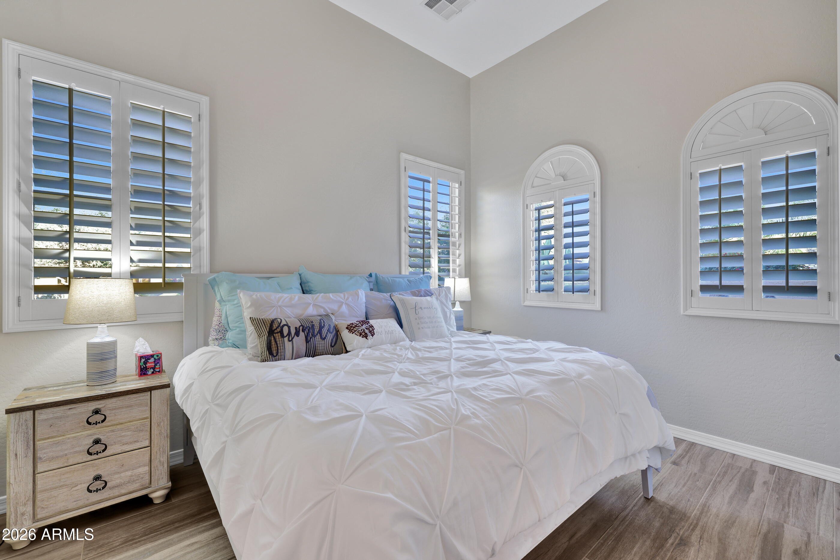 12510 West Bajada Road Peoria, AZ 85383 - Photo 37 of 84 a bedroom with a bed and a window