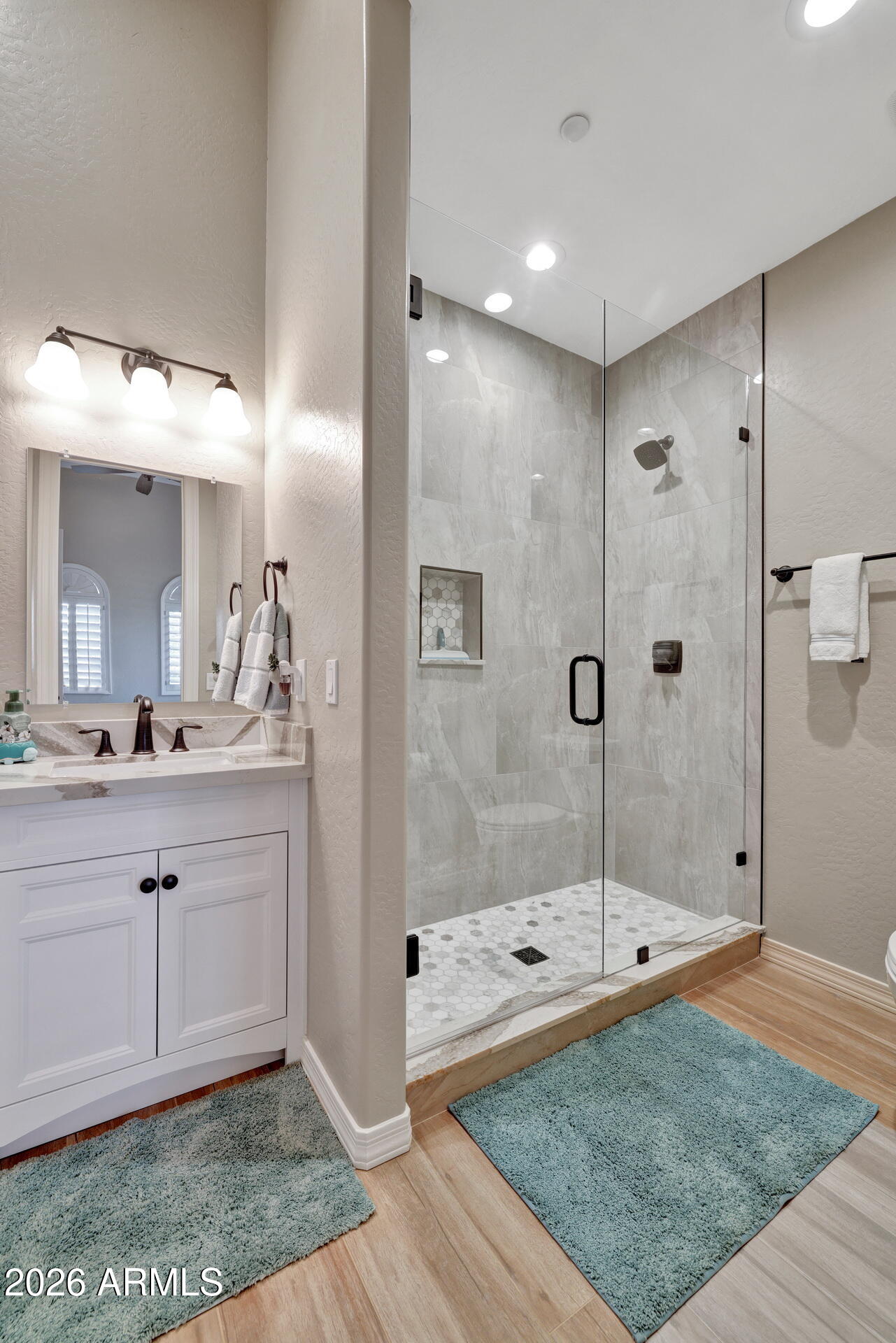 12510 West Bajada Road Peoria, AZ 85383 - Photo 38 of 84 a bathroom with a sink a toilet and shower