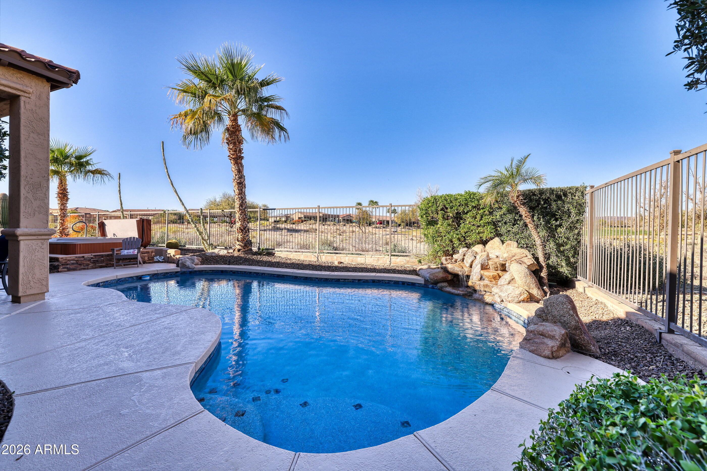 12510 West Bajada Road Peoria, AZ 85383 - Photo 40 of 84 a view of a swimming pool with a lounge chair