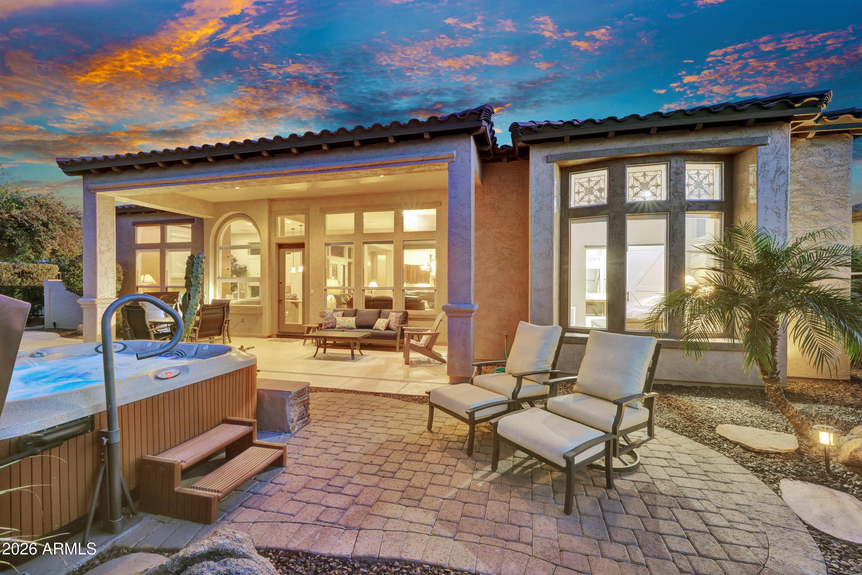 12510 West Bajada Road Peoria, AZ 85383 - Photo 43 of 84 a building outdoor space with patio furniture and potted plants