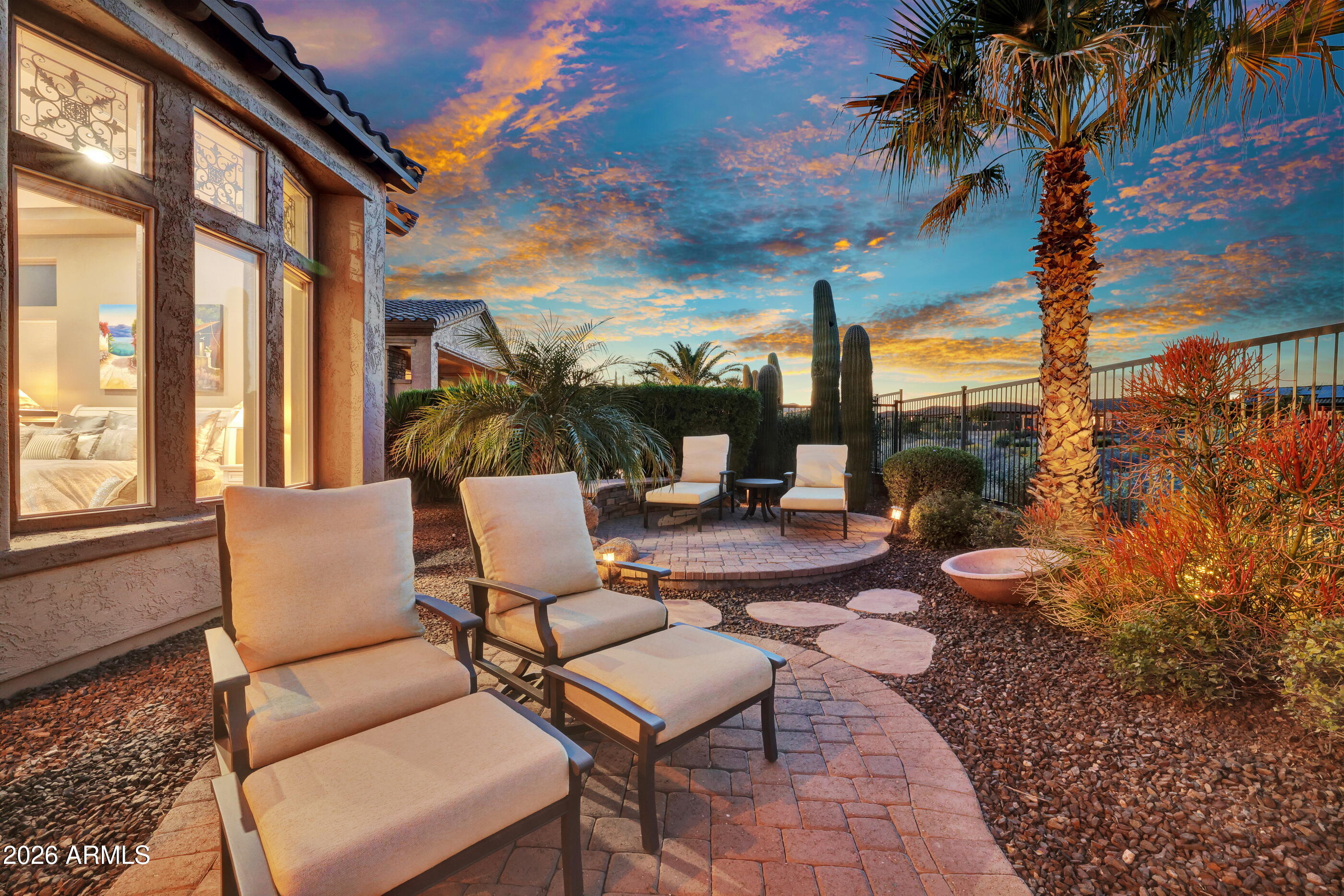 12510 West Bajada Road Peoria, AZ 85383 - Photo 45 of 84 a view of a patio with couches table and chairs and potted plants
