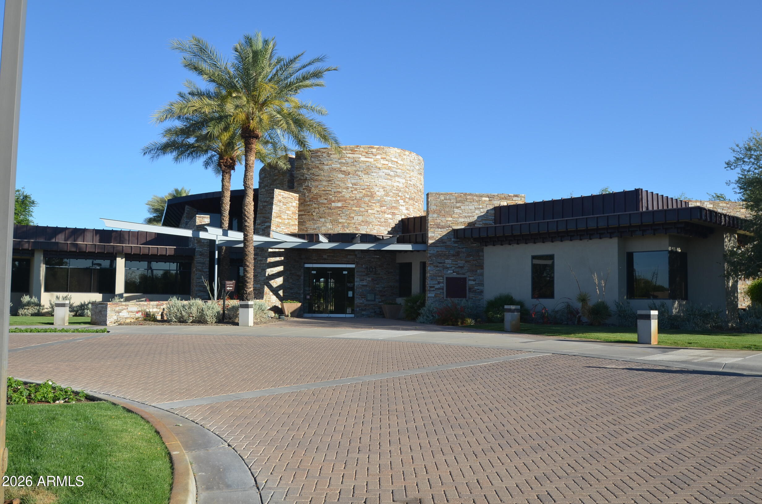 12510 West Bajada Road Peoria, AZ 85383 - Photo 65 of 84 a front view of a house with a yard and a garage