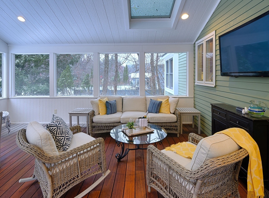43 Edgewood Road Southborough, MA 01772 - Photo 16 of 36 a living room with furniture and a floor to ceiling window