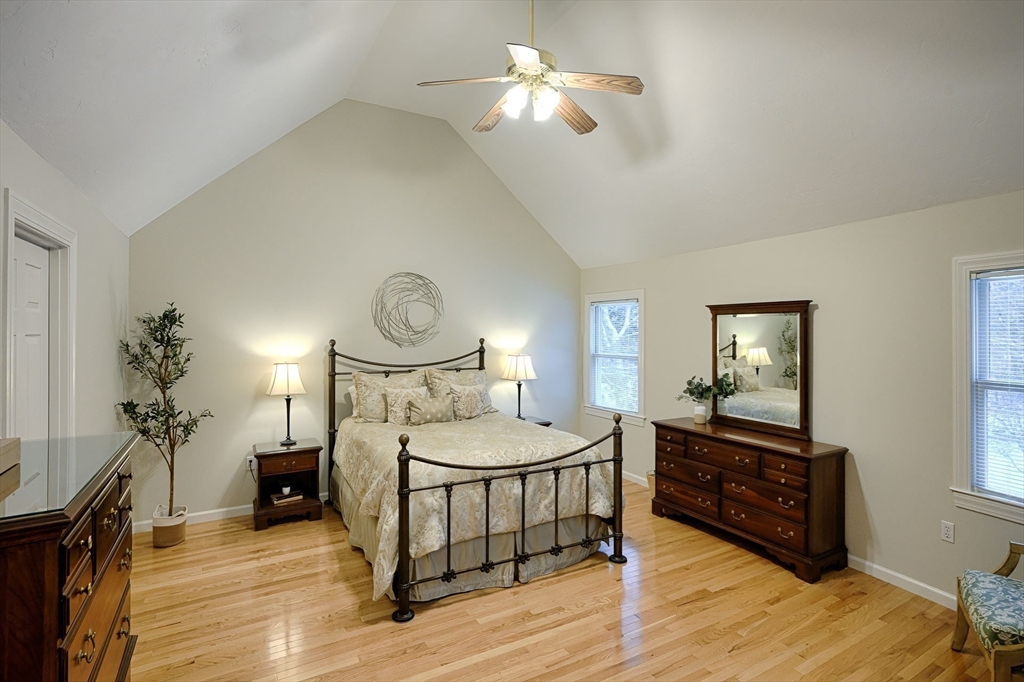 43 Edgewood Road Southborough, MA 01772 - Photo 18 of 36 a bed room with a bed and a chandelier