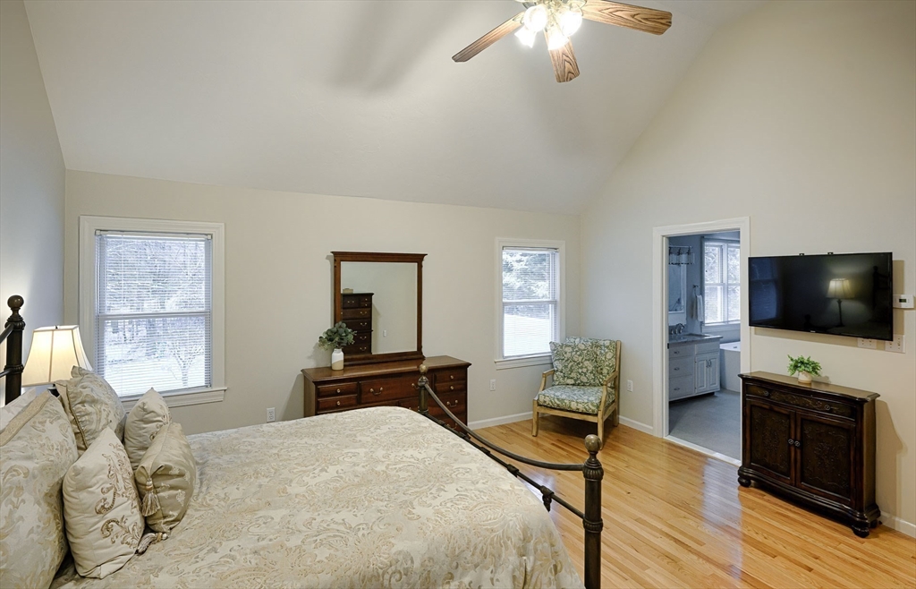 43 Edgewood Road Southborough, MA 01772 - Photo 19 of 36 a bedroom with furniture and a flat screen tv