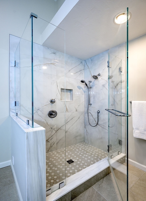 43 Edgewood Road Southborough, MA 01772 - Photo 23 of 36 a bathroom with a glass shower door