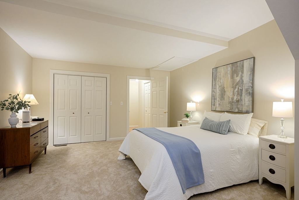 43 Edgewood Road Southborough, MA 01772 - Photo 26 of 36 a bedroom with a bed and a chandelier