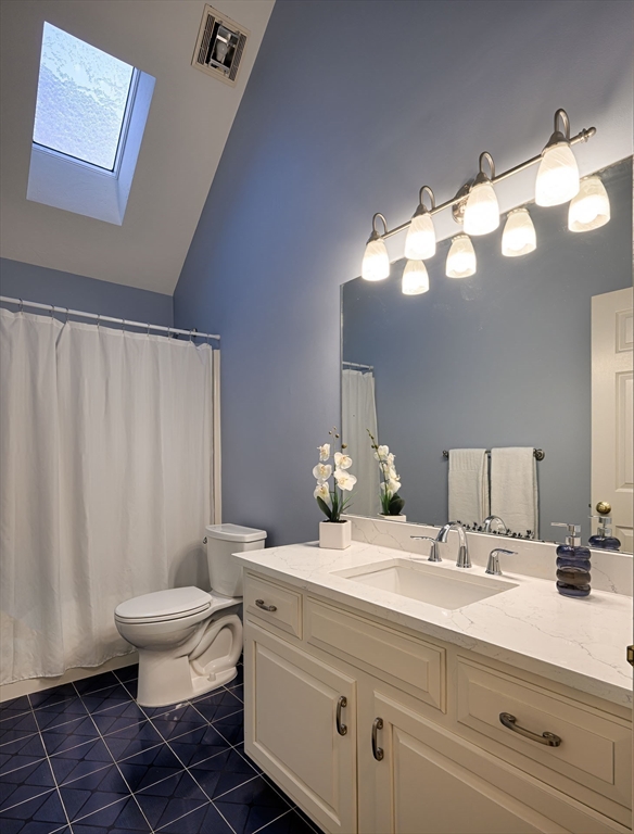 43 Edgewood Road Southborough, MA 01772 - Photo 28 of 36 a bathroom with a double vanity sink mirror and toilet