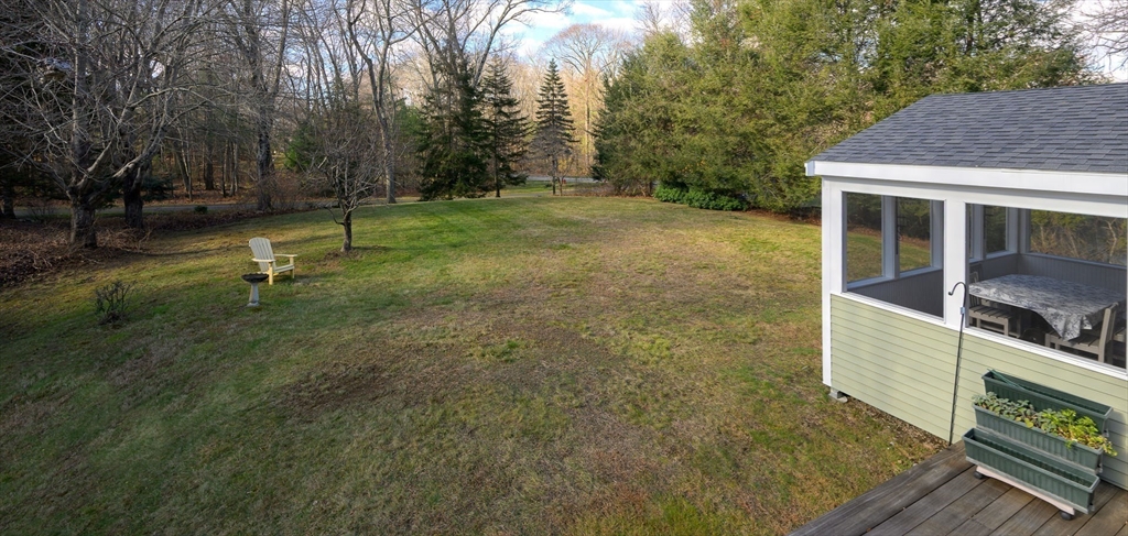 43 Edgewood Road Southborough, MA 01772 - Photo 32 of 36 a backyard of a house with lots of green space