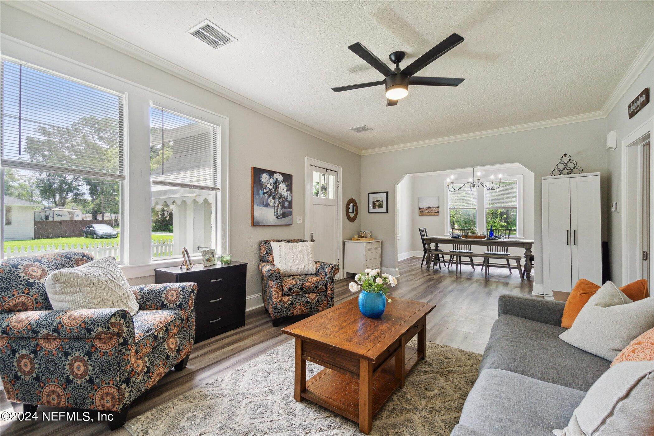1262 Murray Drive Jacksonville, FL 32205 - Photo 12 of 42 a living room with furniture and a large window