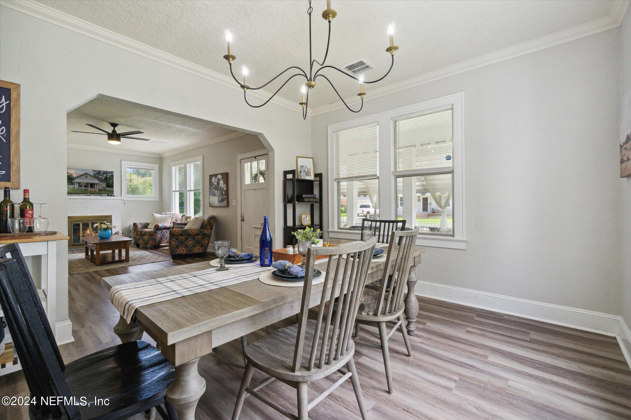 1262 Murray Drive Jacksonville, FL 32205 - Photo 13 of 42 a view of a dining room with furniture window and wooden floor