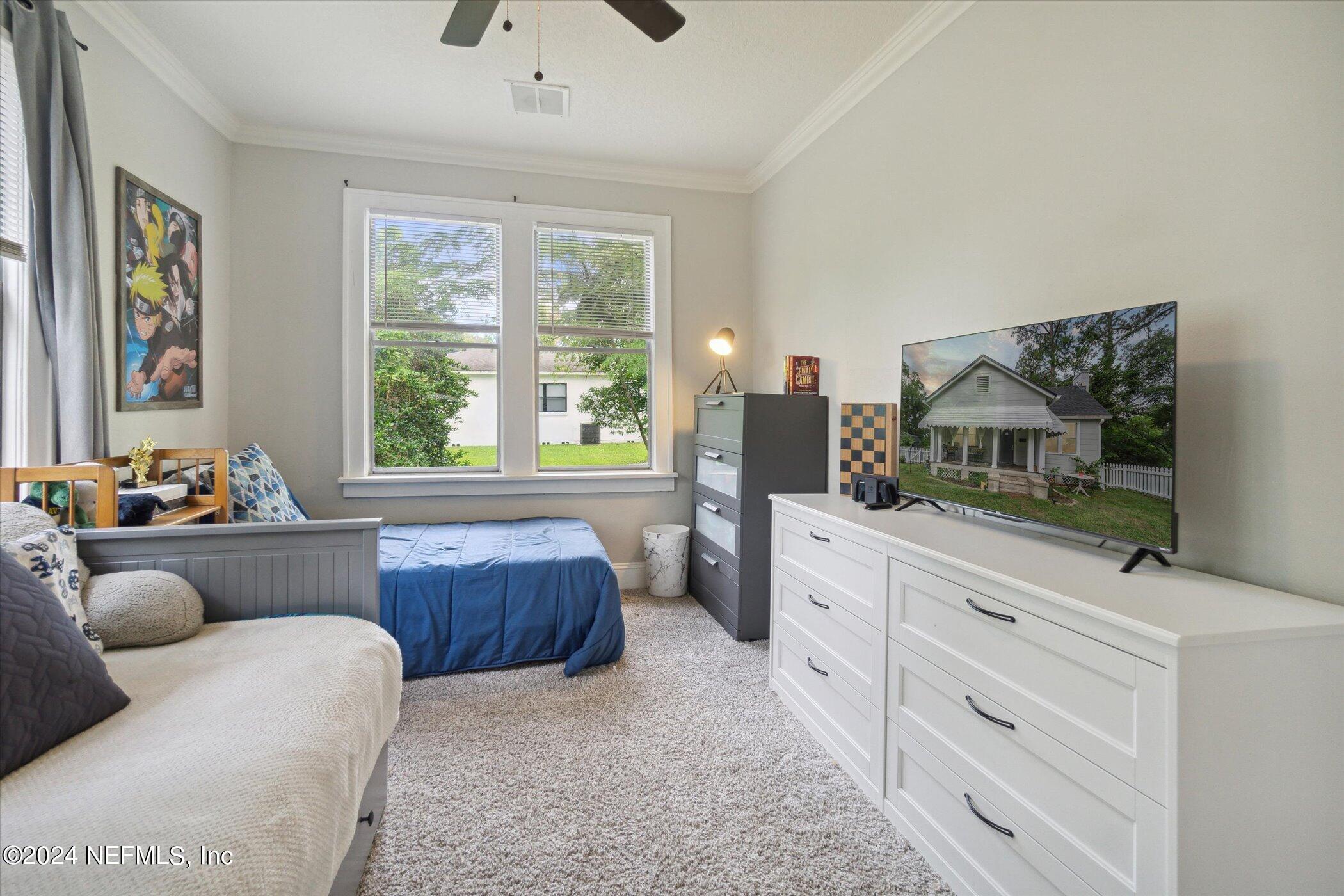 1262 Murray Drive Jacksonville, FL 32205 - Photo 24 of 42 a living room with furniture and a window