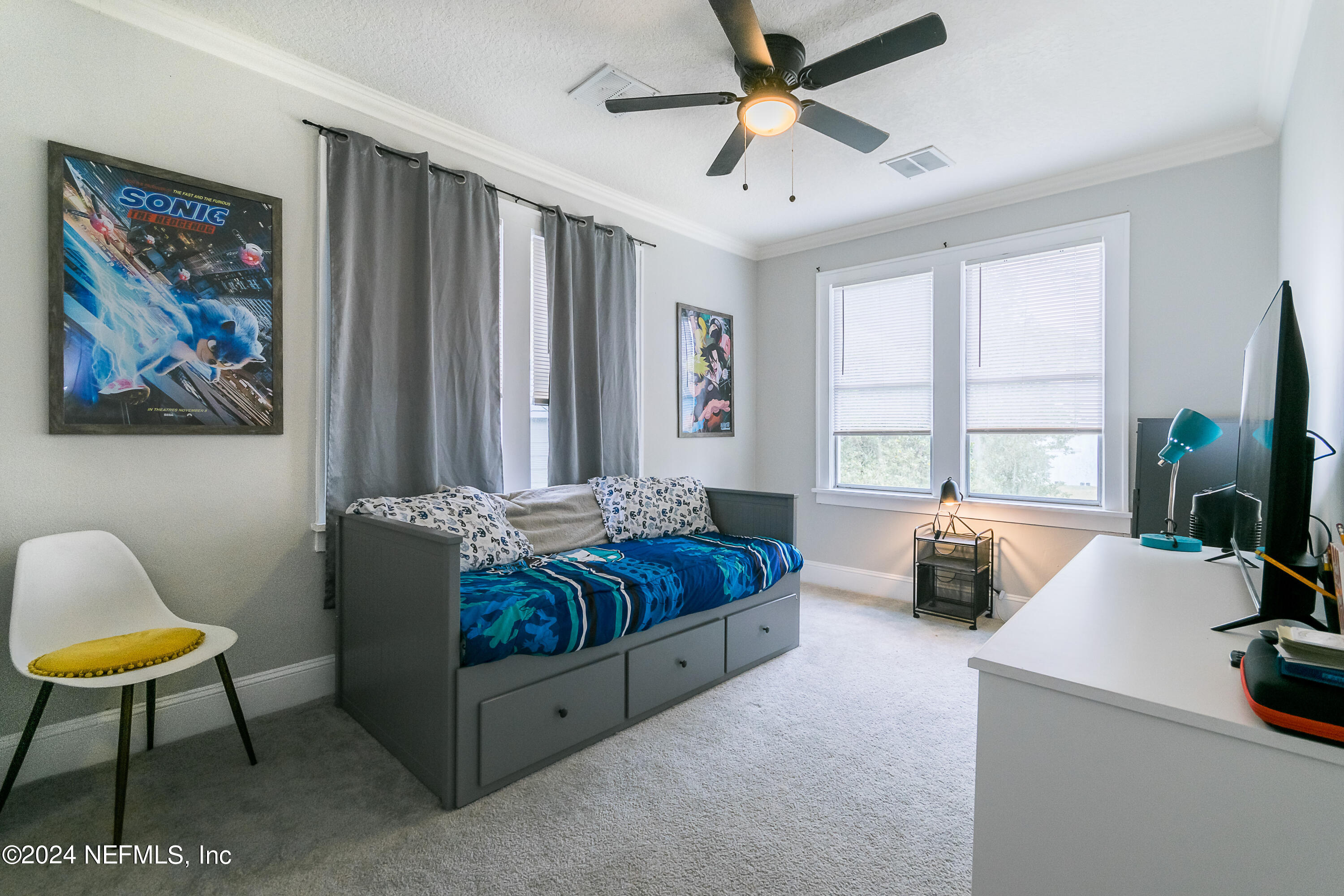 1262 Murray Drive Jacksonville, FL 32205 - Photo 26 of 42 a living room with furniture and a flat screen tv