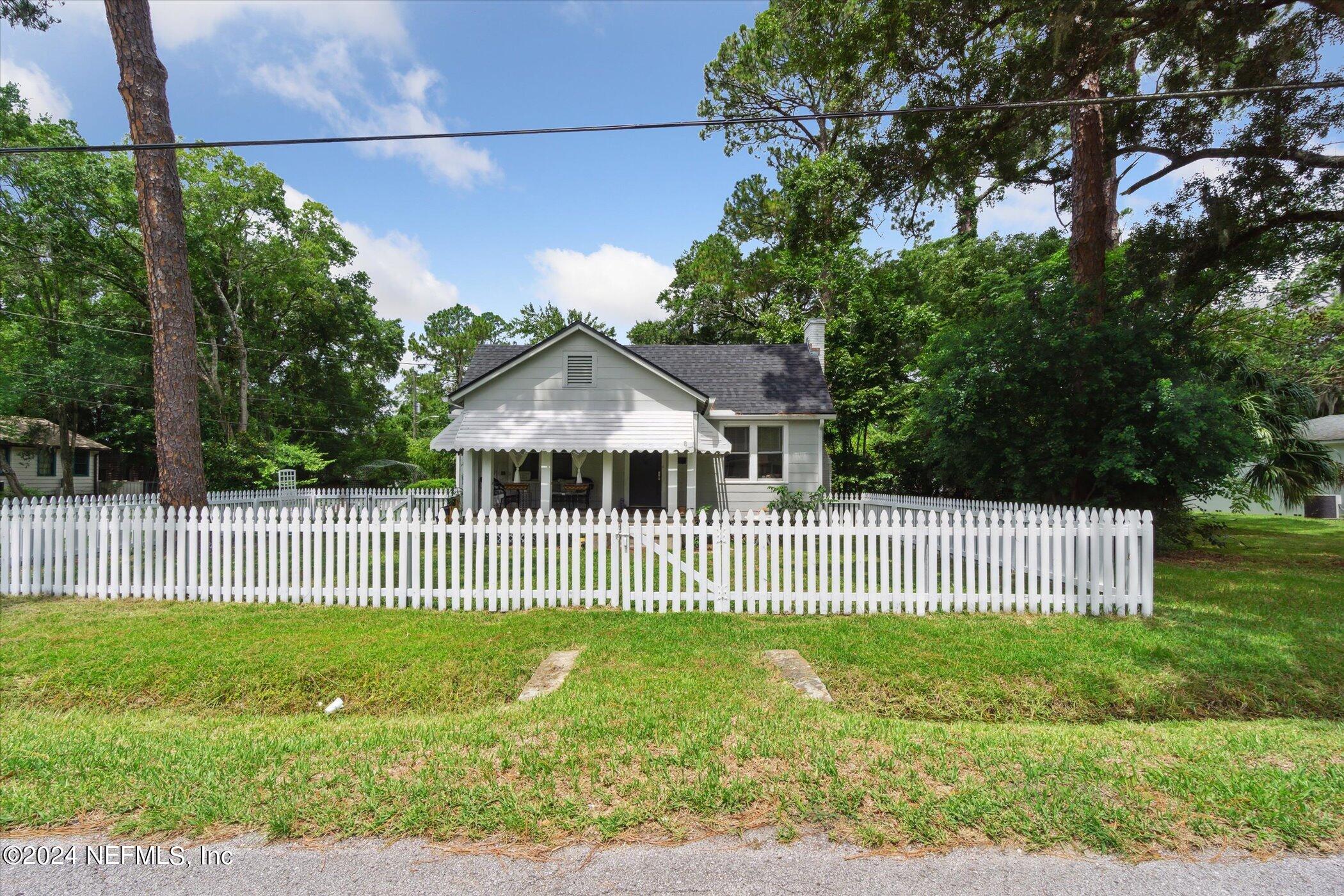 1262 Murray Drive Jacksonville, FL 32205 - Photo 38 of 42 a front view of a house with a garden