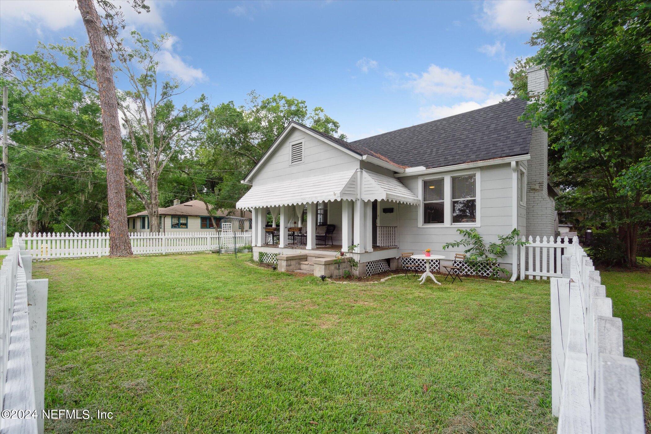 1262 Murray Drive Jacksonville, FL 32205 - Photo 42 of 42 a front view of a house with a yard patio and green space