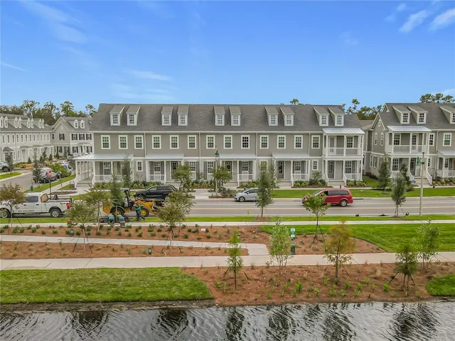 a view of a city with an ocean view