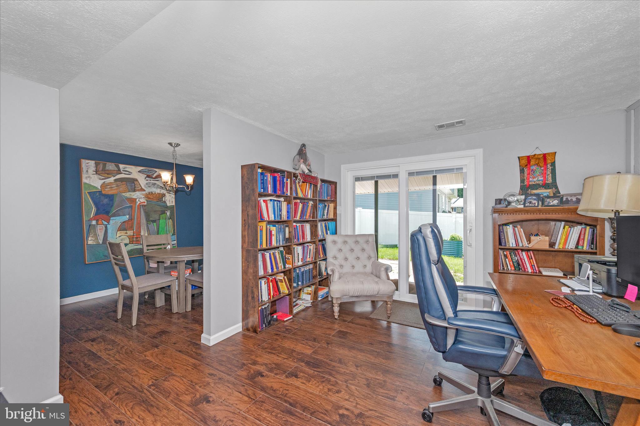 330 Heather Ridge Drive Frederick, MD 21702 - Photo 11 of 39 a view of a workspace with furniture and a bookshelf