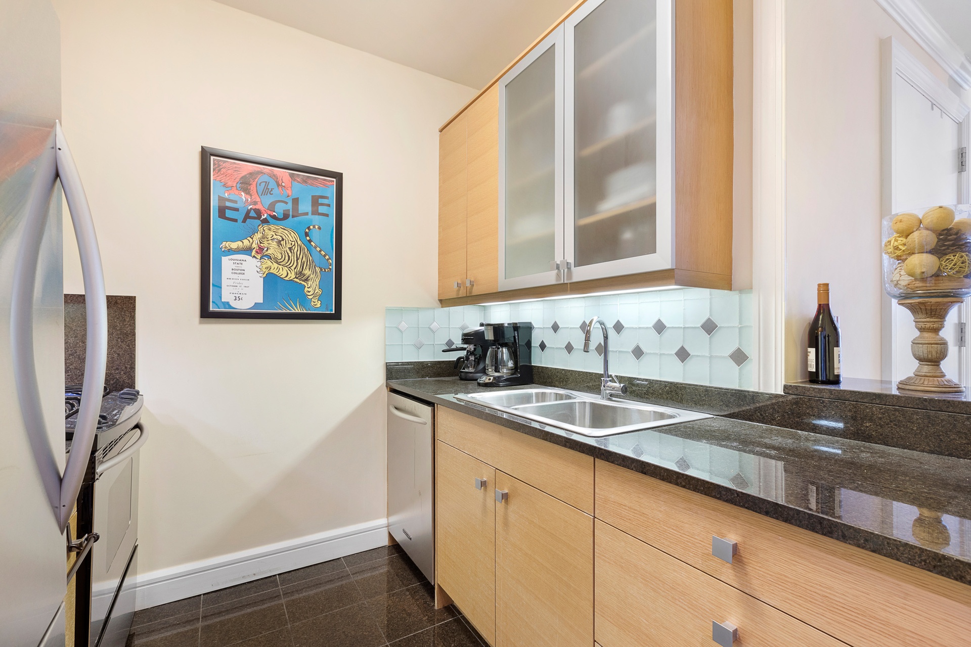 120 Riverside Boulevard, Unit 8J Manhattan, NY 10069 - Photo 3 of 13 a bathroom with a granite countertop sink and a window