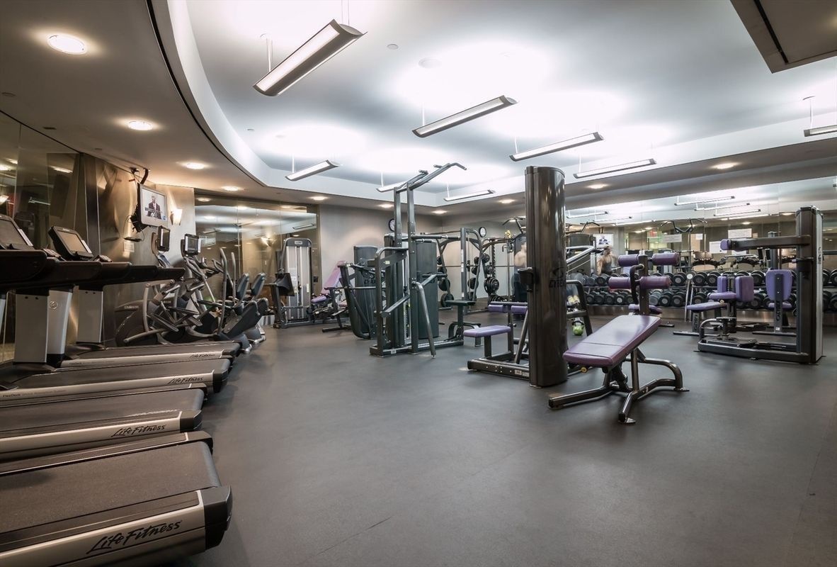 120 Riverside Boulevard, Unit 8J Manhattan, NY 10069 - Photo 9 of 13 a view of a room with gym equipment
