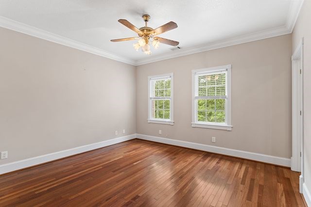 1190 Maple Grove Road Morganton, GA 30560 - Photo 65 of 96 an empty room with wooden floor and windows