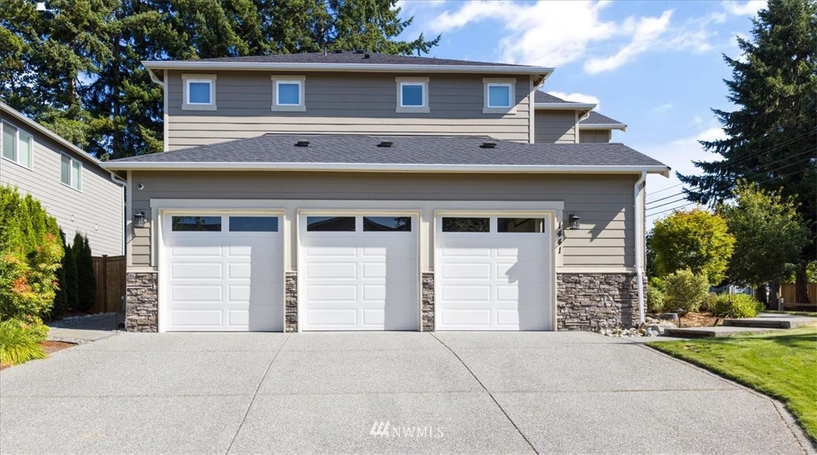 1441 242nd Place Southeast Bothell, WA 98021 - Photo 3 of 40 front view of a house