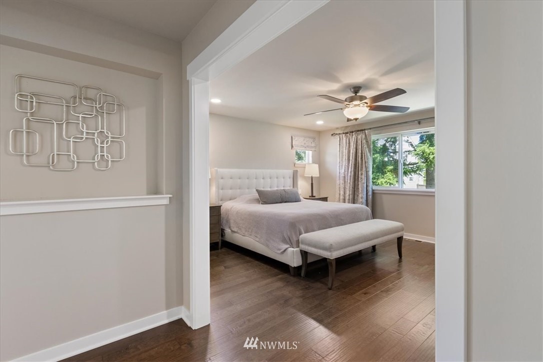 1441 242nd Place Southeast Bothell, WA 98021 - Photo 32 of 40 a bedroom with a bed and a window
