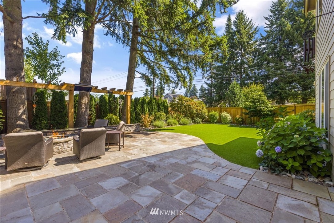 1441 242nd Place Southeast Bothell, WA 98021 - Photo 36 of 40 a view of a patio with swimming pool and sitting area