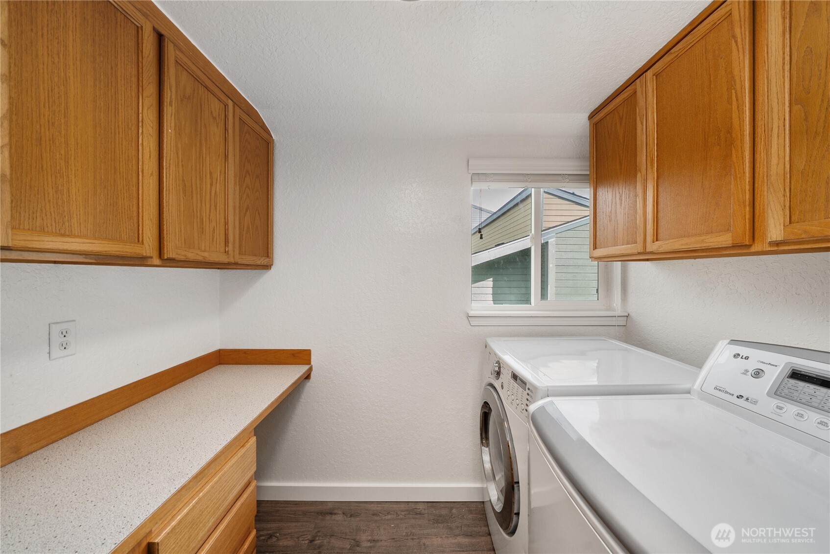 14401 Southeast Petrovitsky Road, Unit G204 Renton, WA 98058 - Photo 11 of 29 a utility room with dryer and washer