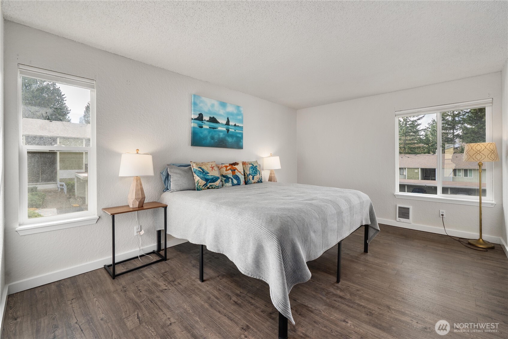 14401 Southeast Petrovitsky Road, Unit G204 Renton, WA 98058 - Photo 13 of 29 a bedroom with a bed and a large window